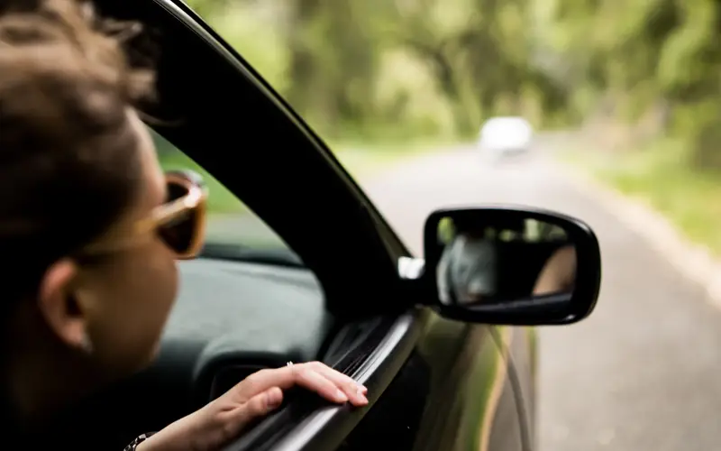 Woman riding in car